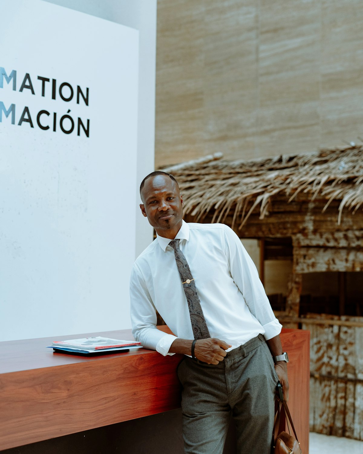 Finance director standing in the office lobby