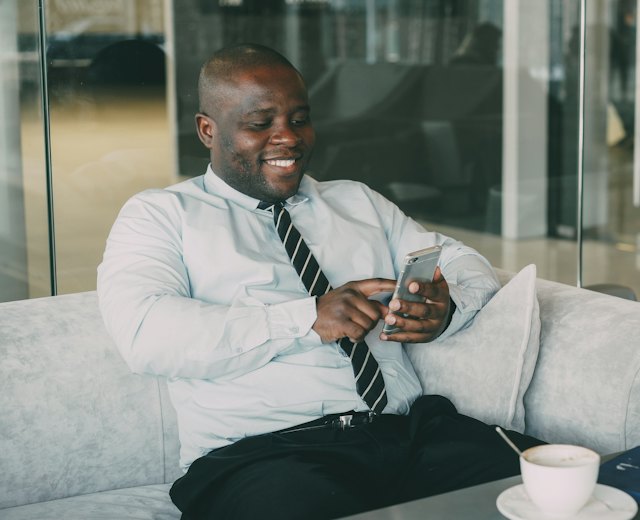 Manager approving a request on his phone