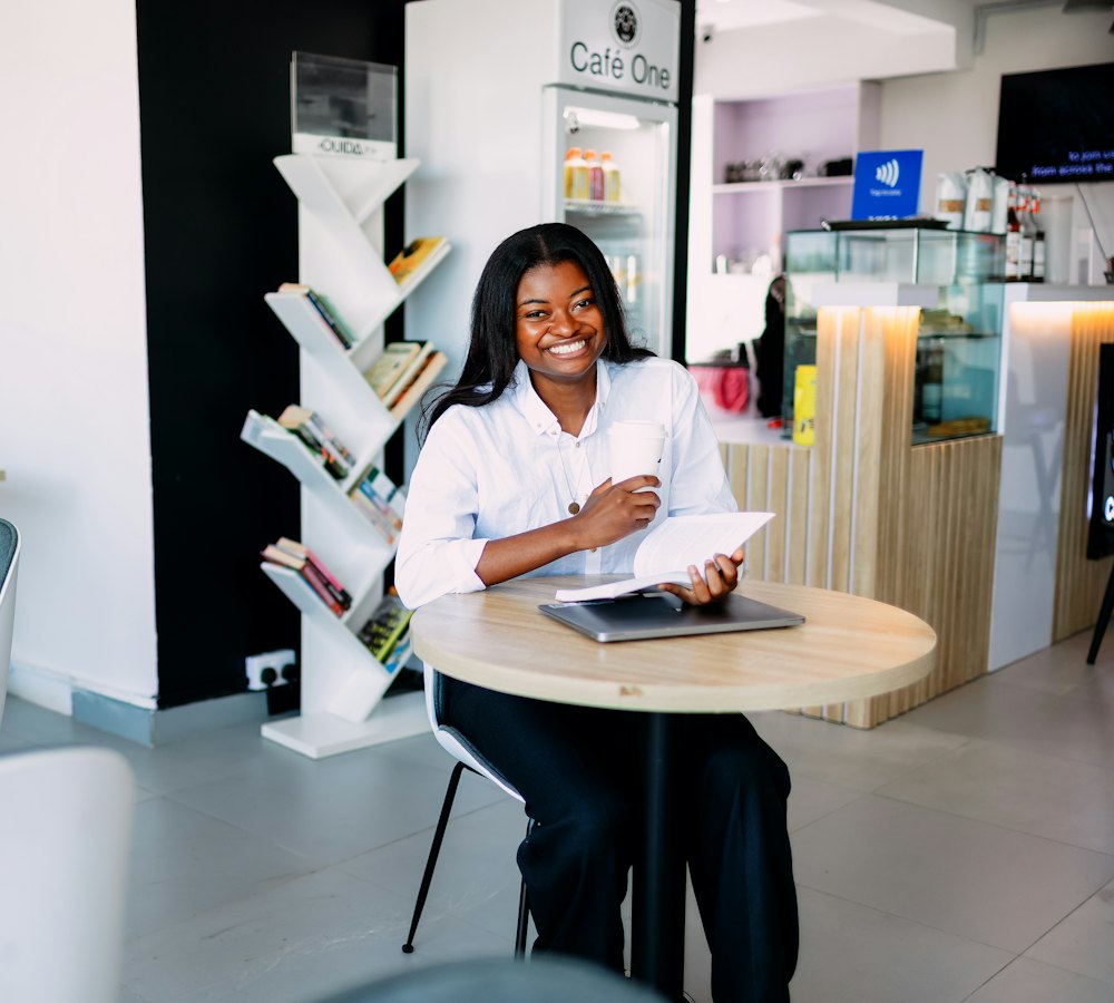 Business owner smiling at work in her office