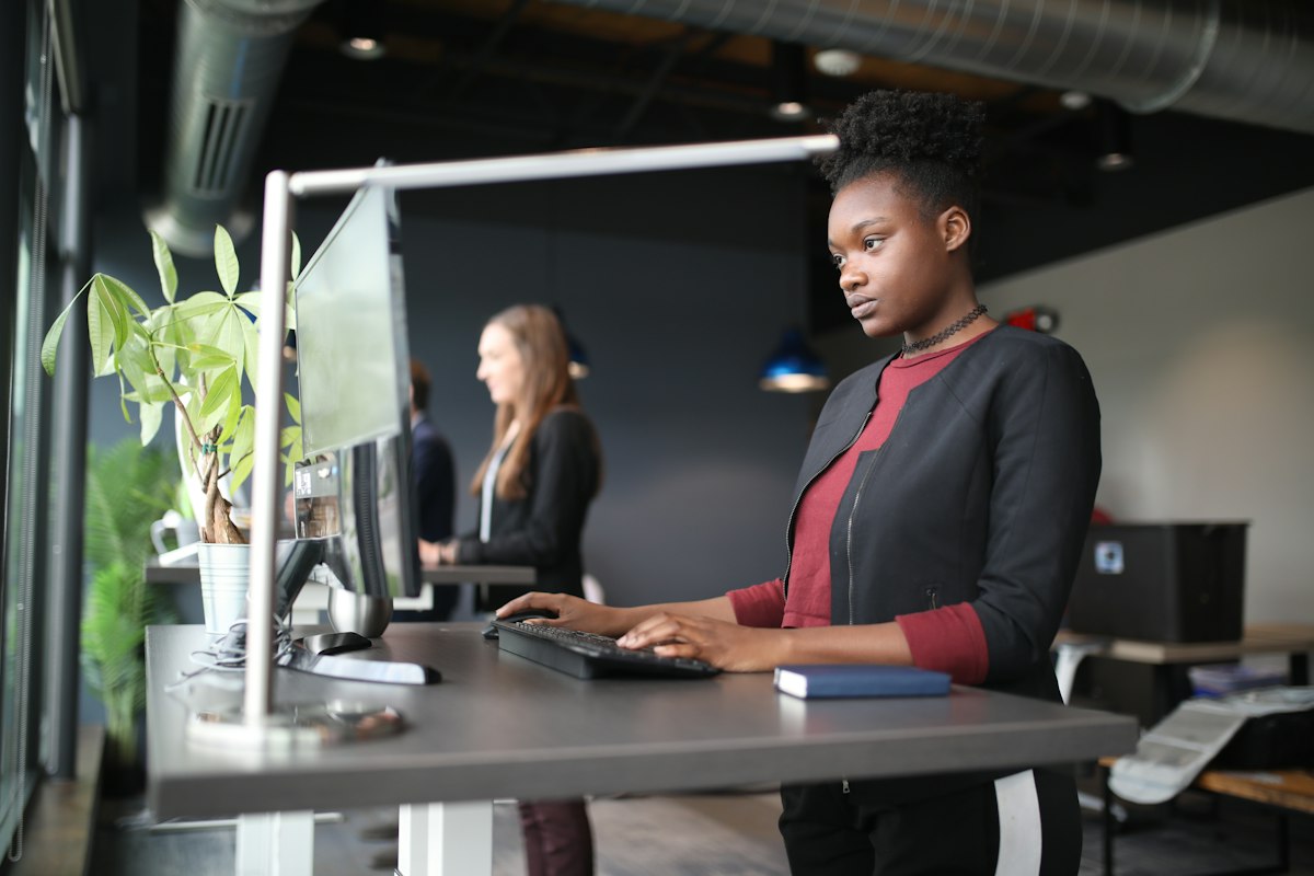Estimator pricing a job at her desk