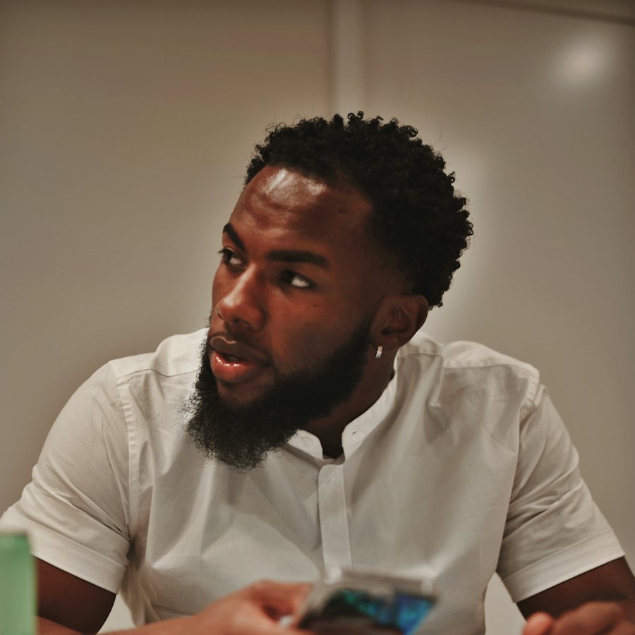 Employee frowning at a crumpled receipt and his phone