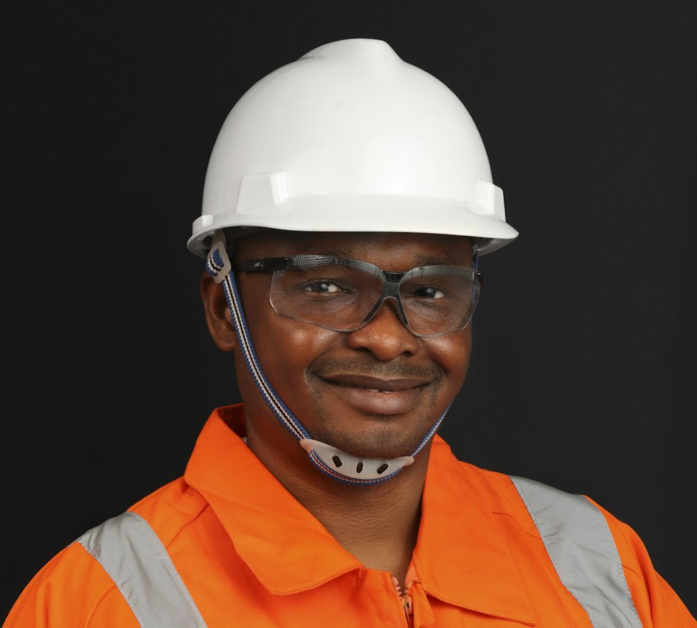 Field technician in a hard hat and safety gear