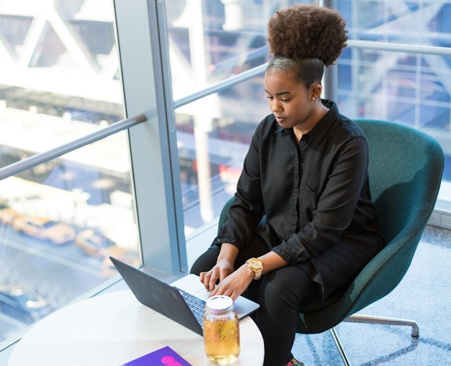 Procurement officer working on her laptop