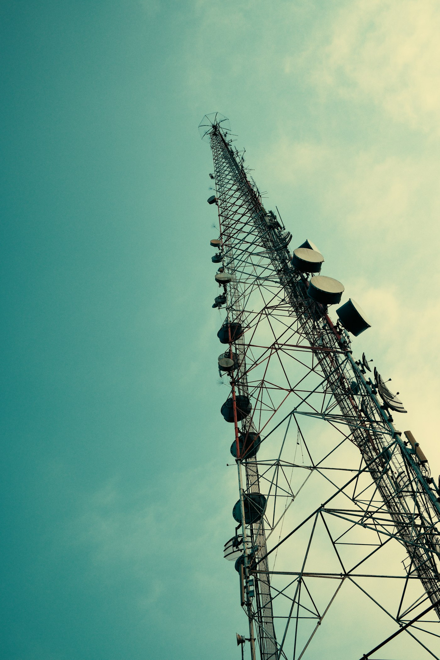 Telecommunication tower against a blue sky