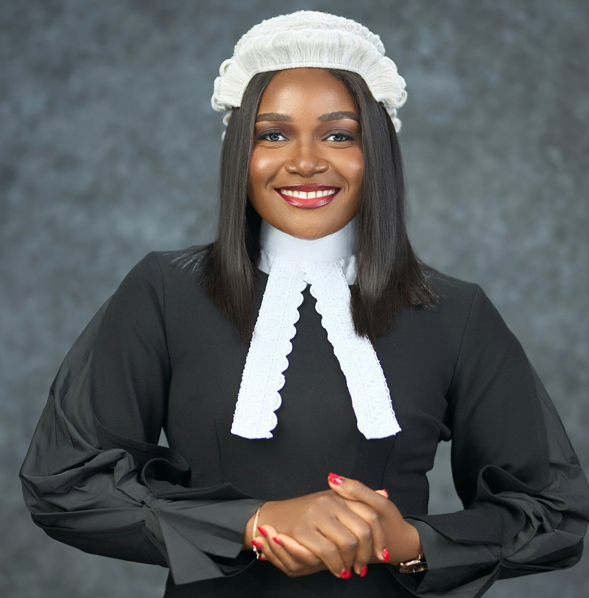 Advocate in court dress smiling