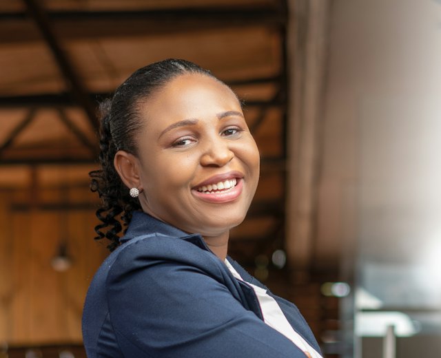 Operations manager smiling at work