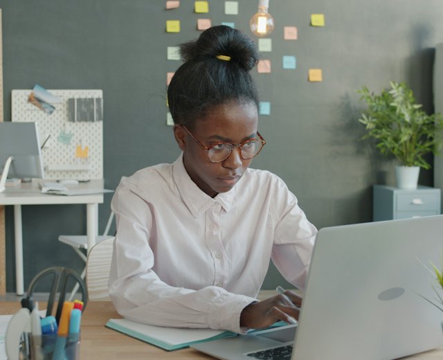 Finance officer working on her laptop