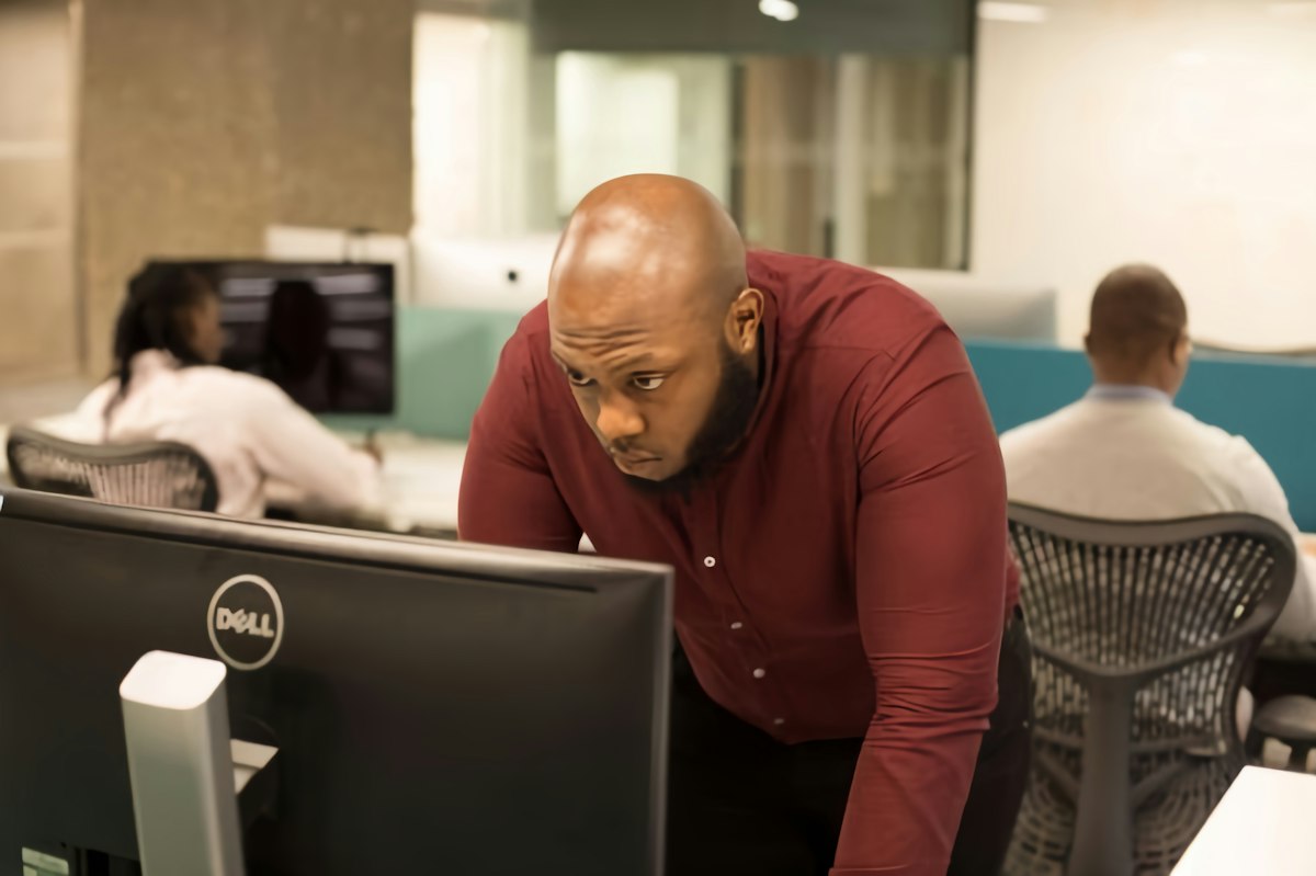 Operations manager working at a computer in the office