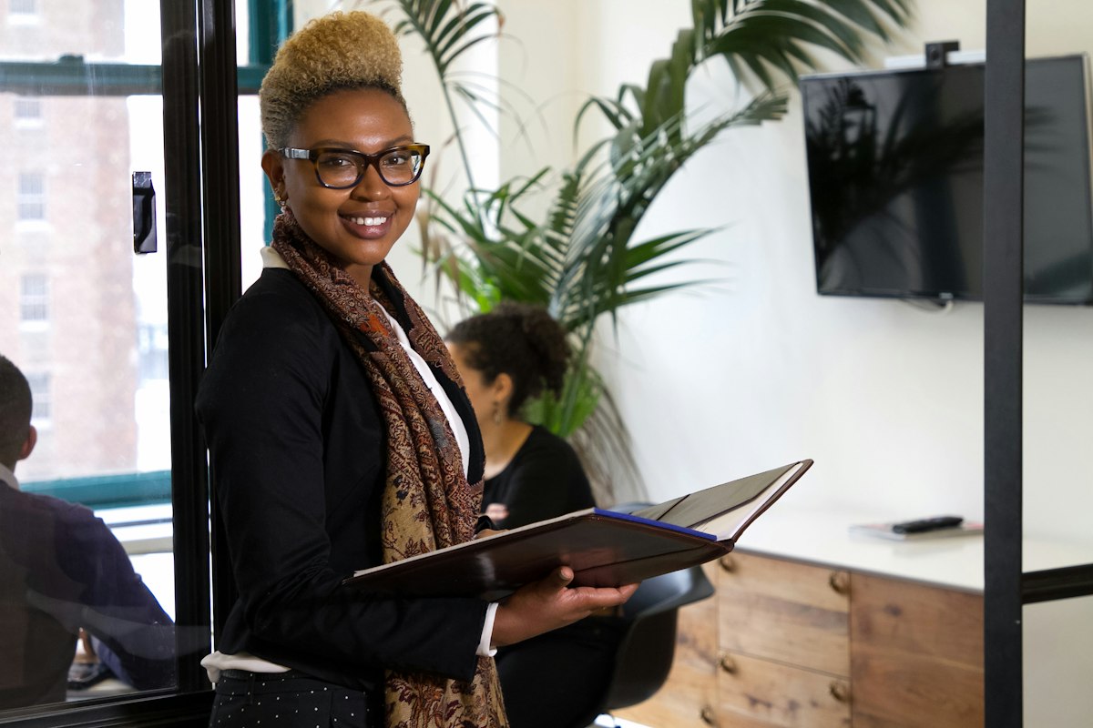 Procurement manager holding a folder in the office