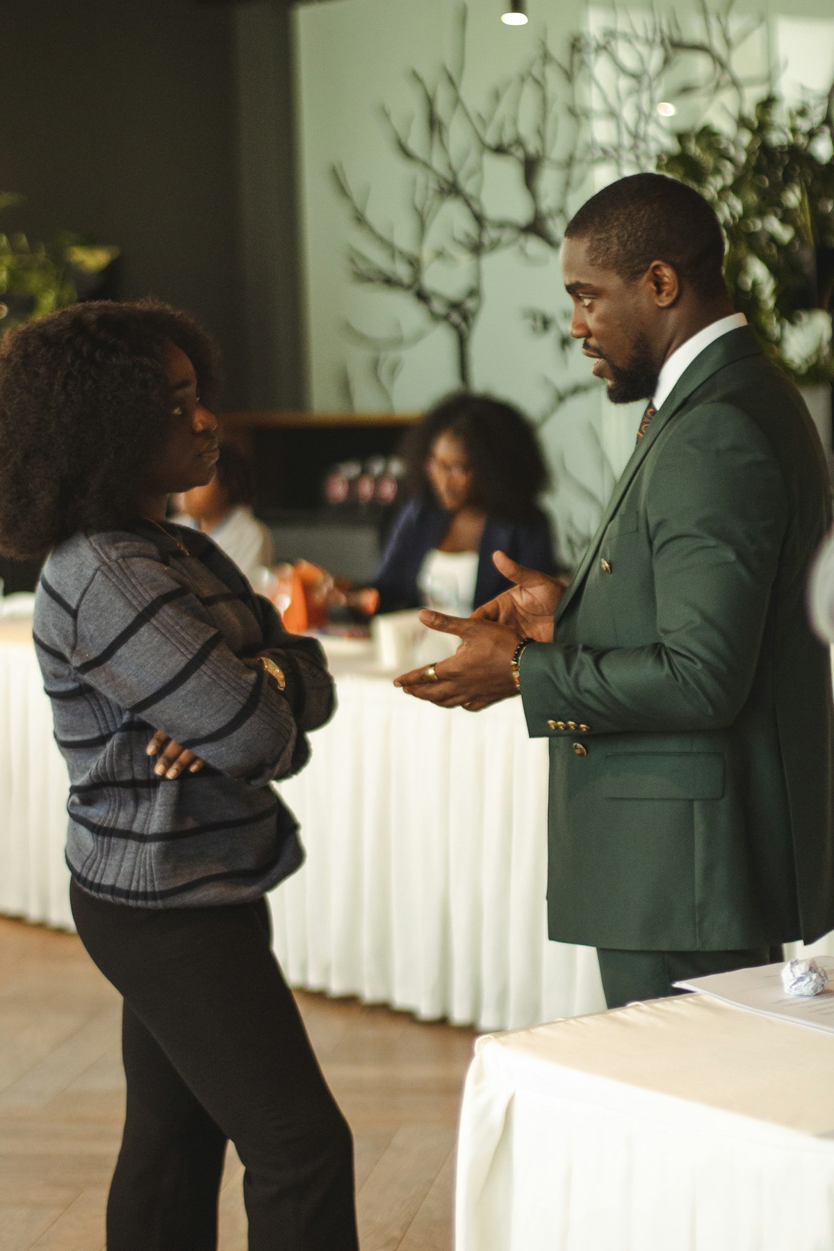 Procurement manager talking with a supplier in a meeting room